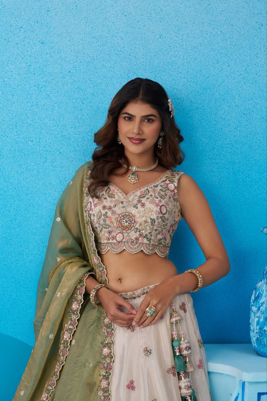 Cream Tissue Sequins Embroidered Lehenga And Blouse With Dupatta