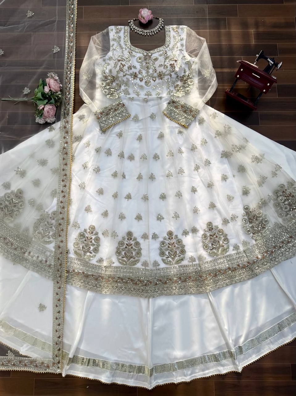 Stunning White Festive Wear Lehenga Gown With Gota Patti and Fancy Lace