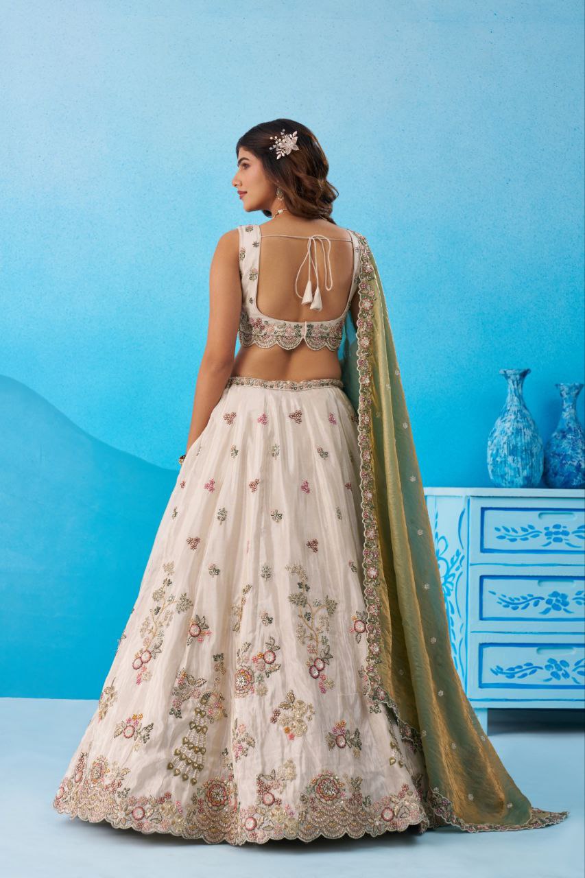 Cream Tissue Sequins Embroidered Lehenga And Blouse With Dupatta