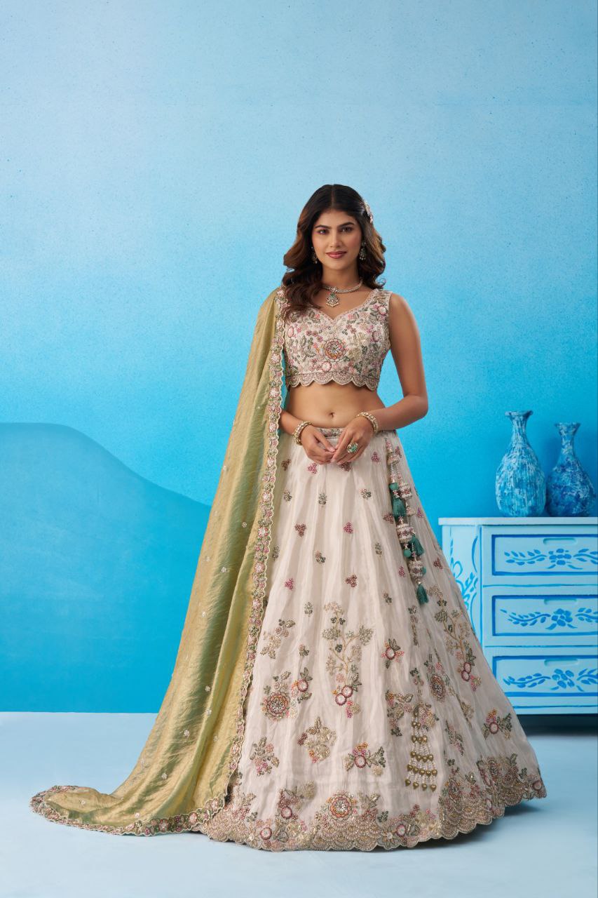 Cream Tissue Sequins Embroidered Lehenga And Blouse With Dupatta