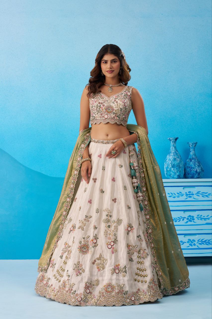 Cream Tissue Sequins Embroidered Lehenga And Blouse With Dupatta