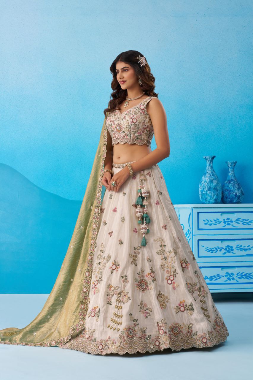 Cream Tissue Sequins Embroidered Lehenga And Blouse With Dupatta
