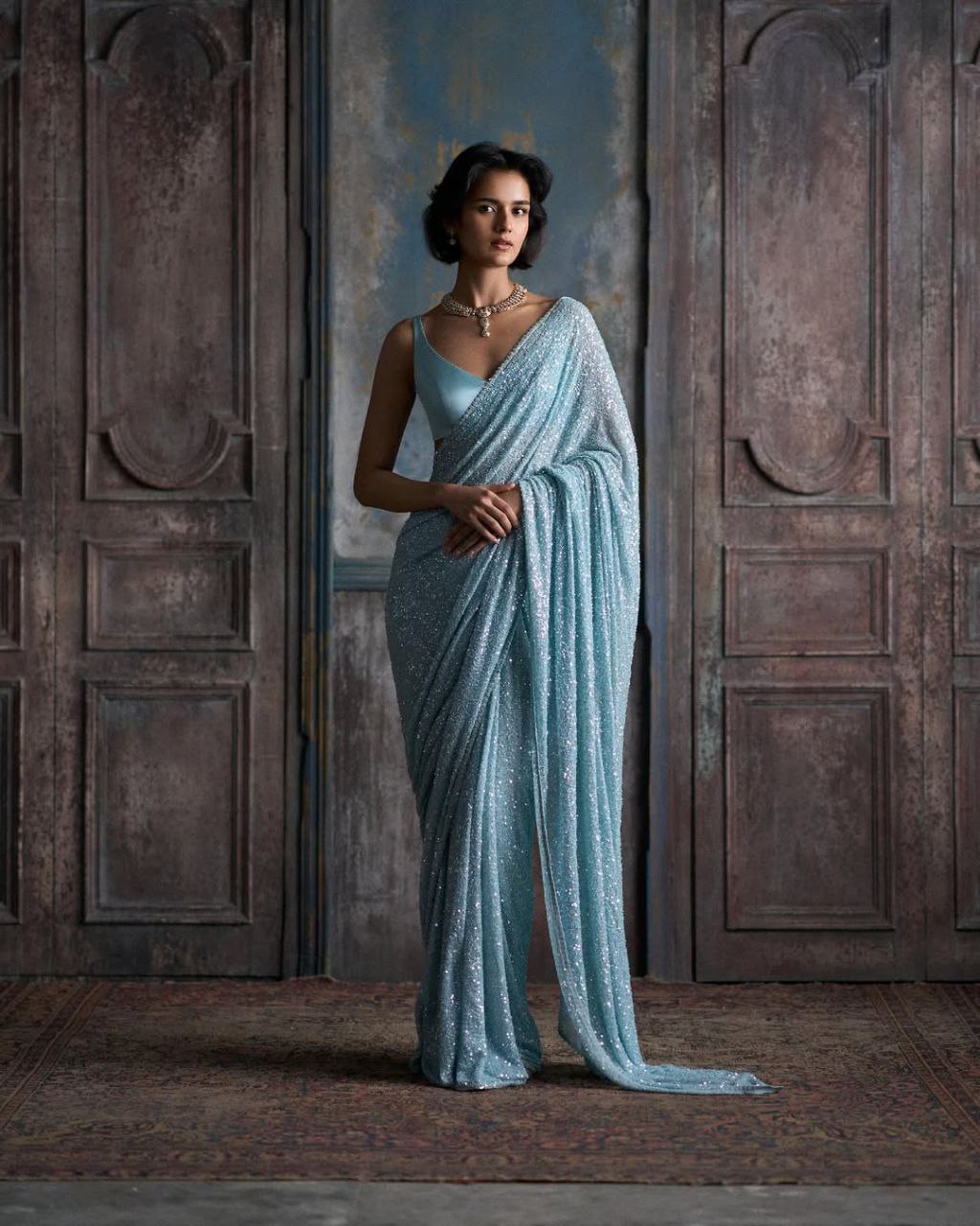 Saree Of FAUX Georgette With Heavy  Khichdi Sequence Embrodery Work